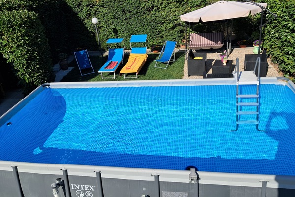 Appartamento familiare, 1 camera da letto, vista giardino, edificio separato | Biancheria da letto di alta qualità, ferro/asse da stiro