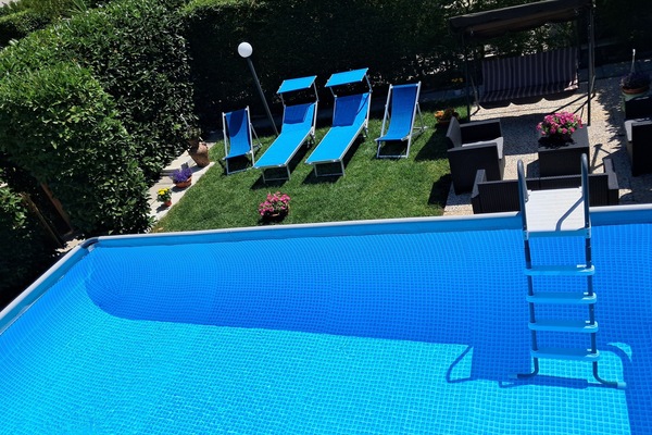 Appartamento familiare, 1 camera da letto, vista giardino, edificio separato | Biancheria da letto di alta qualità, ferro/asse da stiro