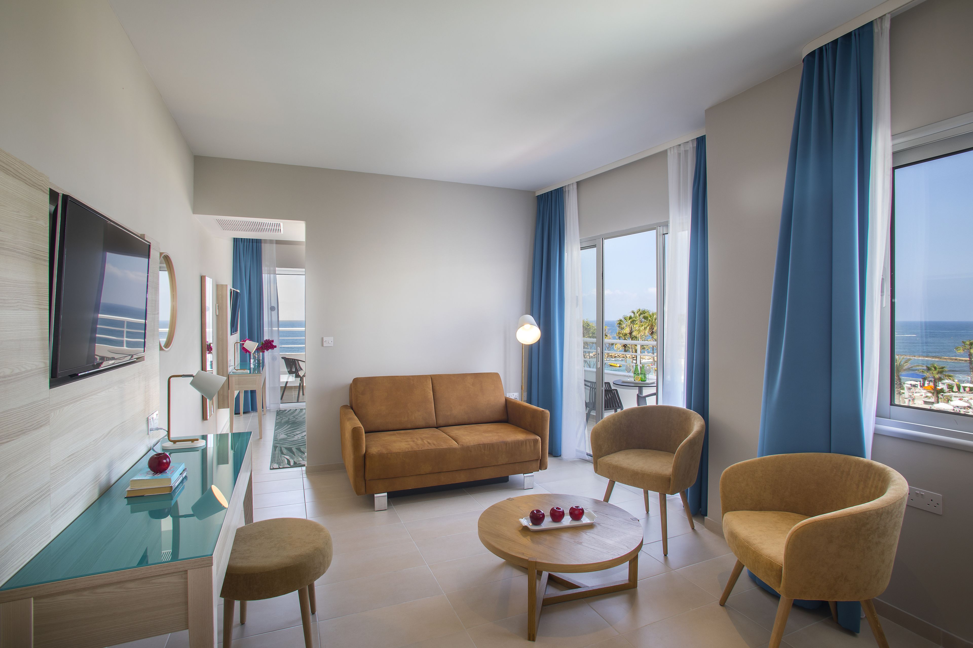 executive suite, sea view | living area | flat-screen tv