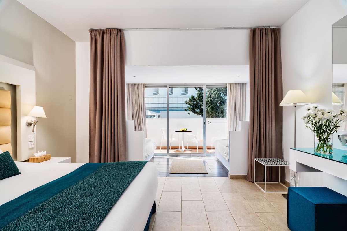 Family Room, Partial Sea View | 1 bedroom, hypo-allergenic bedding, minibar, in-room safe