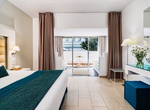 Family Room, Partial Sea View | 1 bedroom, hypo-allergenic bedding, minibar, in-room safe