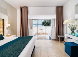 Family Room, Partial Sea View | 1 bedroom, hypo-allergenic bedding, minibar, in-room safe