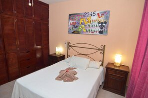 Apartment, 2 Bedrooms, Balcony | 2 bedrooms, in-room safe, desk, iron/ironing board - Apartment with Balcony Rinconada Del Sol (Playa del Carmen)