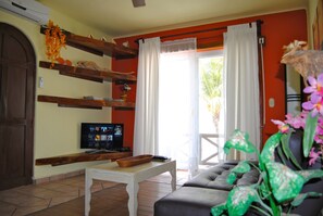 Standard Apartment, 2 Bedrooms, Smoking, City View | Living room | Flat-screen TV