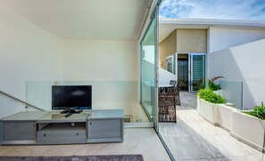 Luxury Penthouse, 2 Bedrooms, Balcony, Beach View | Living area | Flat-screen TV