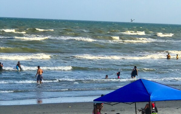 On the beach, sun-loungers, beach towels