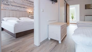 Suite, 1 slaapkamer | Een minibar, een kluis op de kamer, gratis wifi, beddengoed