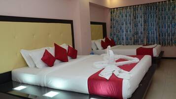Family Suite, Multiple Beds, Smoking, City View | 1 bedroom, in-room safe, desk, iron/ironing board