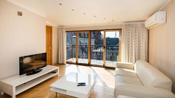 Family Apartment, 2 Bedrooms, Terrace, City View | Soundproofing, iron/ironing board, free WiFi, bed sheets