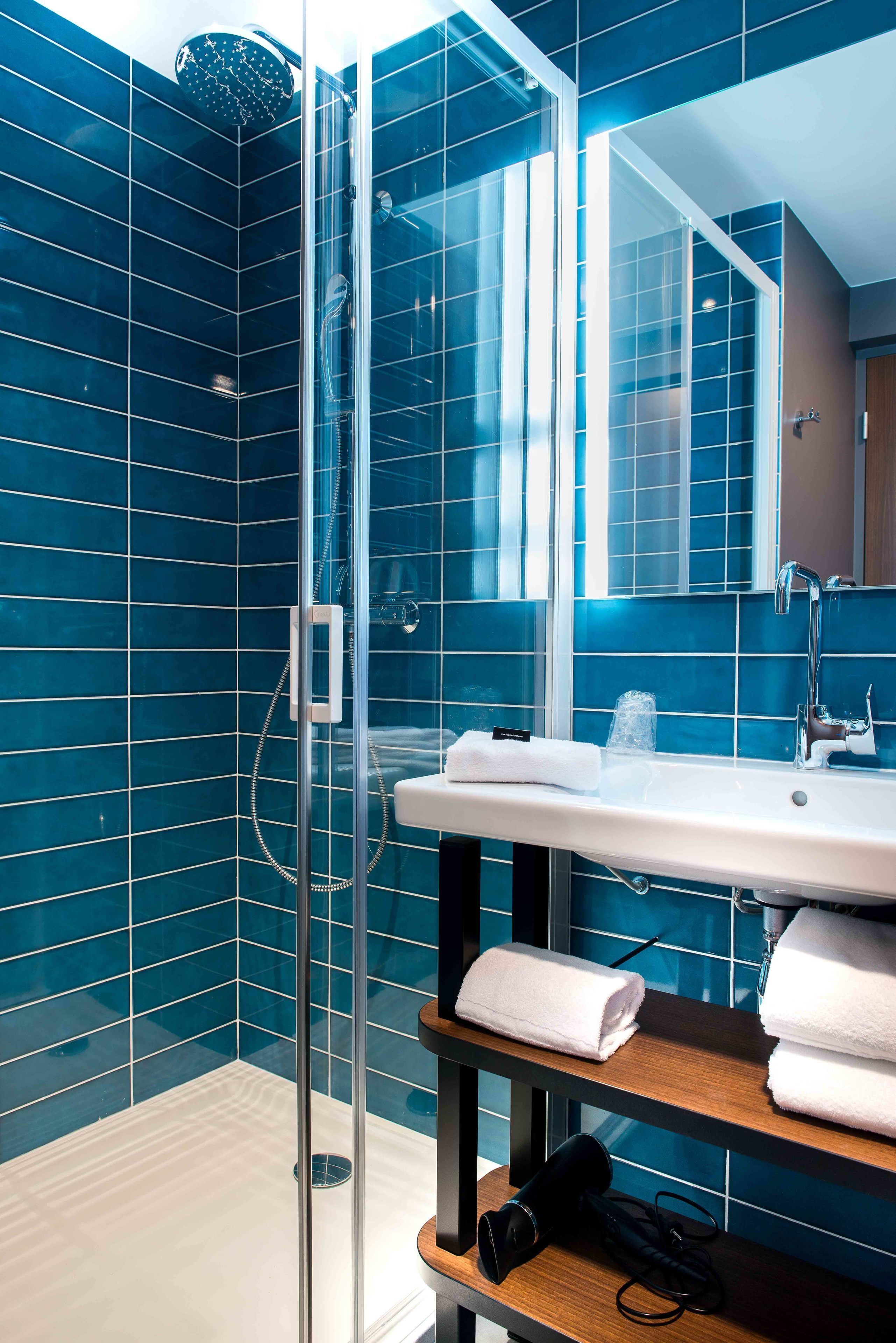 Bathroom | Shower, free toiletries, hair dryer, towels