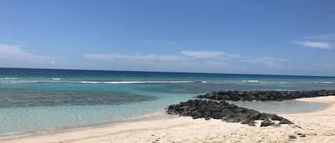 On the beach, sun loungers, beach towels