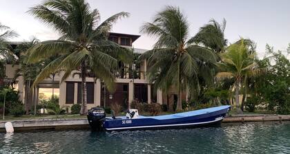 Beautiful Beachfront Island Home, Private Dock, Village Transportation Included