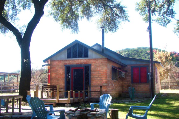 Large Oak trees keep the Cabin shaded.