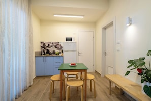 Family Room, 2 Bedrooms | Living area | Flat-screen TV