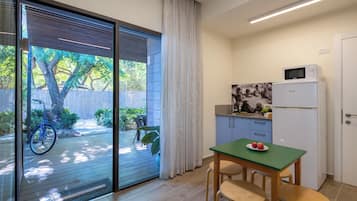 Family Room, 2 Bedrooms | Living area | Flat-screen TV