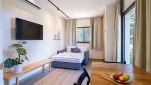 Habitación cuádruple familiar | Zona de estar