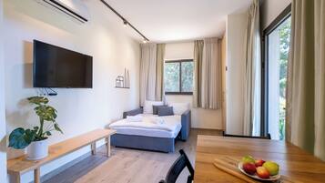 Neljän hengen perhehuone | Oleskelualue | Taulutelevisio