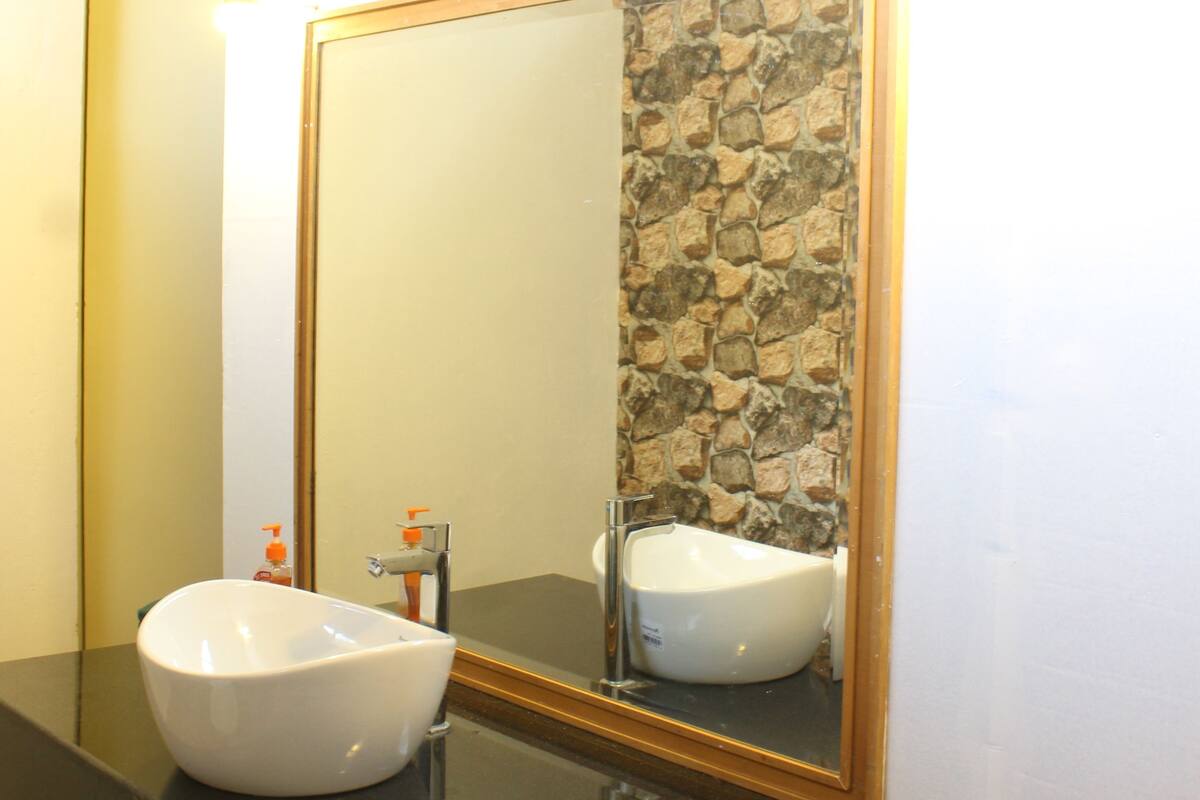 shower, designer toiletries, towels