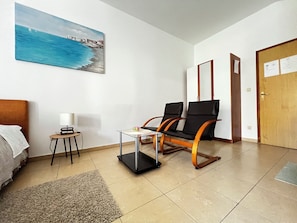 Suite estudio | Área de sala de estar
