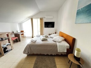 Chambres insonorisées, fer et planche à repasser, draps fournis