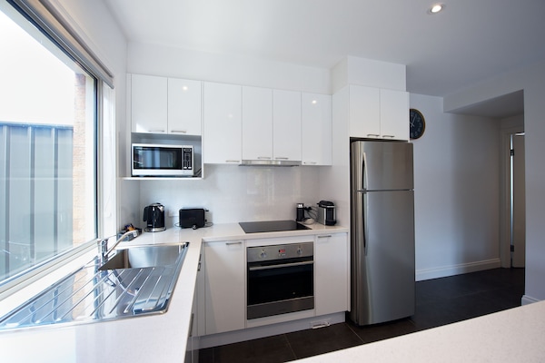 Full-sized fridge, microwave, espresso maker, coffee/tea maker