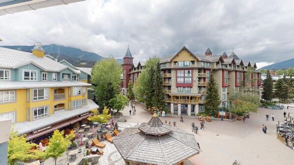 A traditional European-style building with multiple balconies and a central courtyard. - Village Location -Penthouse floor  - View - Hot tub - newly renovated - Eagle Lodge (Whistler)
