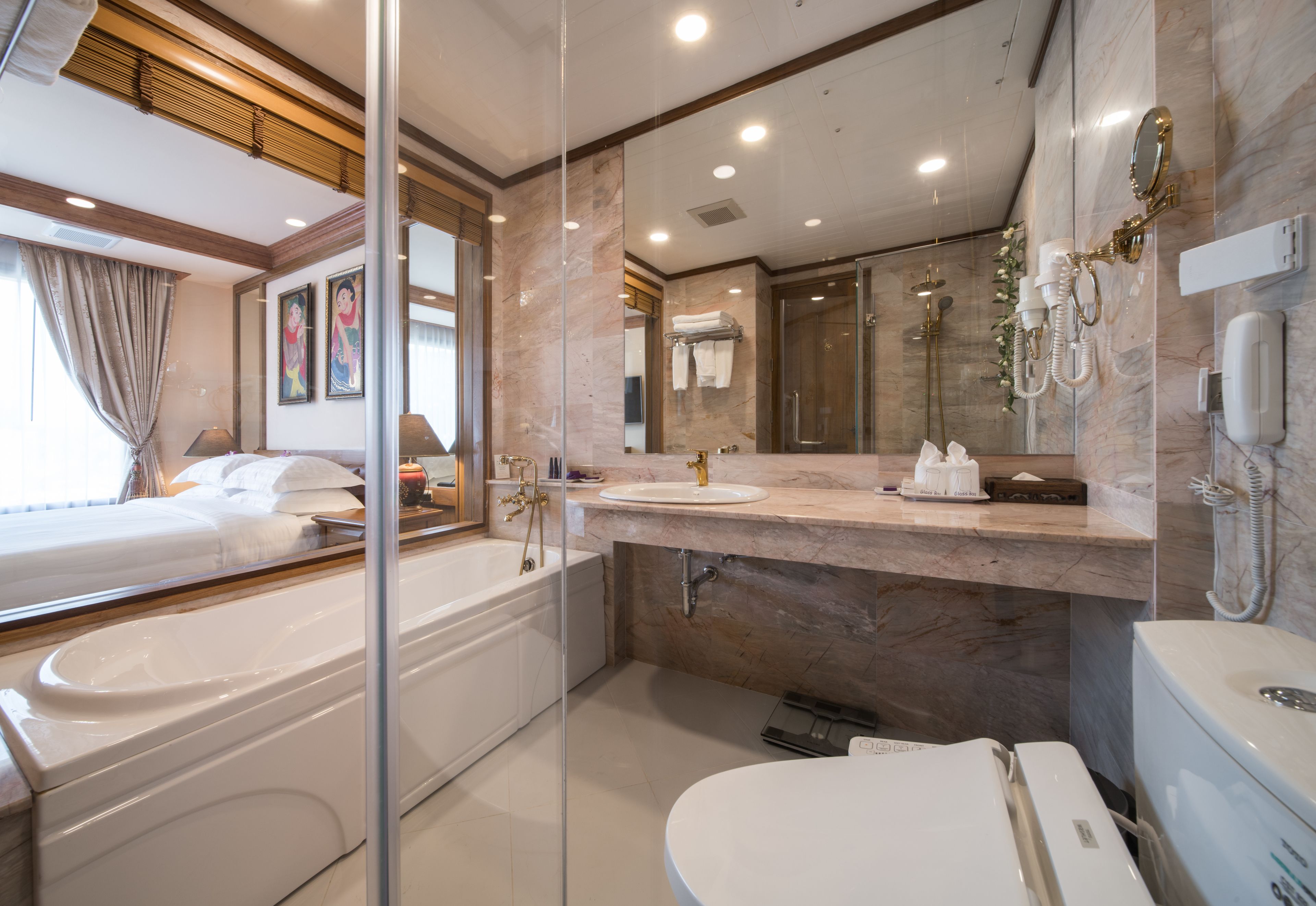 superior room | bathroom | separate bathtub and shower, rainfall showerhead, free toiletries