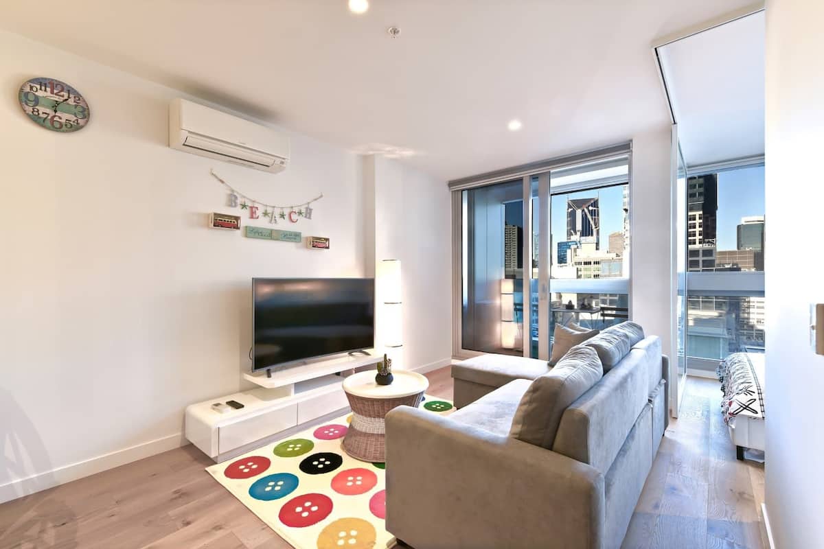 Design Apartment, 2 Bedrooms | Living area | Flat-screen TV