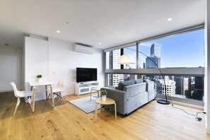Family Apartment, 2 Bedrooms, City View | Living area | Flat-screen TV - Southern cross The fifth Apartment (Melbourne)