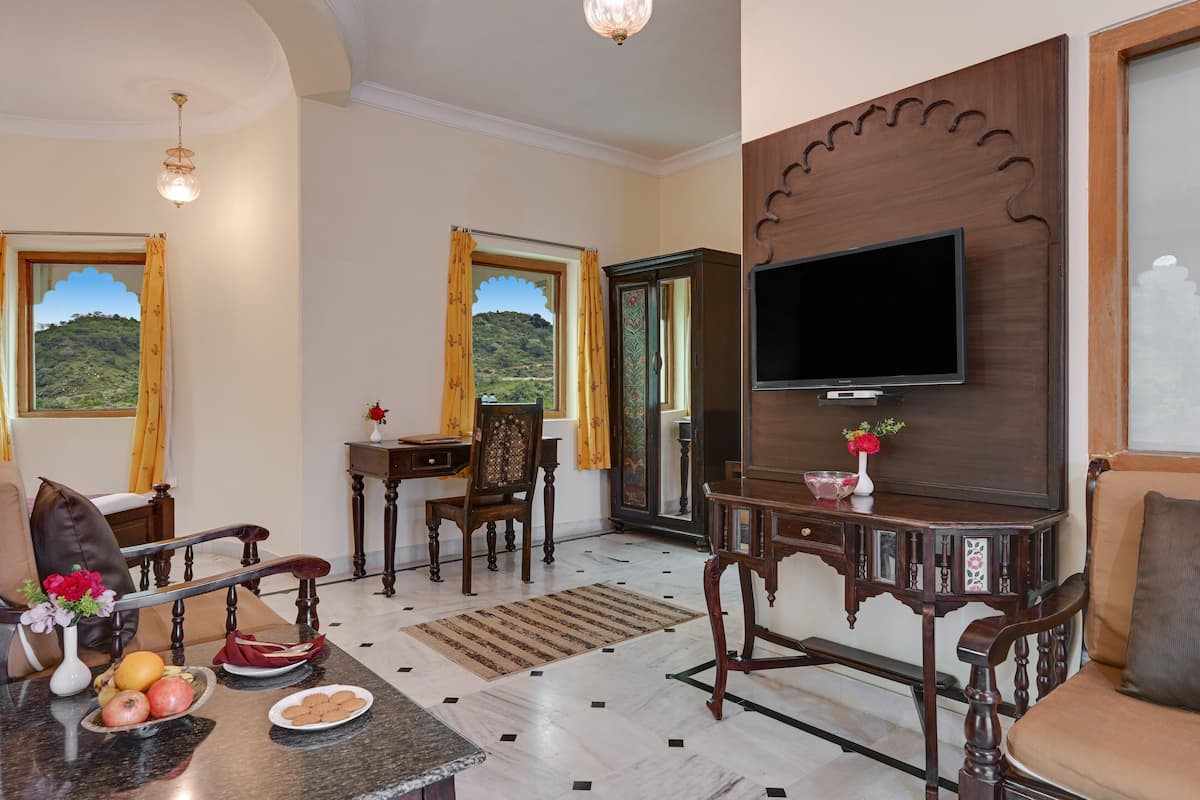 Premium Room | Living area | Flat-screen TV
