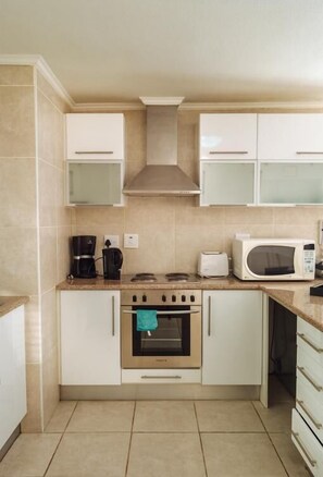 Apartment | Private kitchen | Fridge, microwave, oven, stovetop