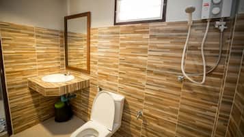 Beachfront Bungalow | Bathroom | Shower, bidet, towels