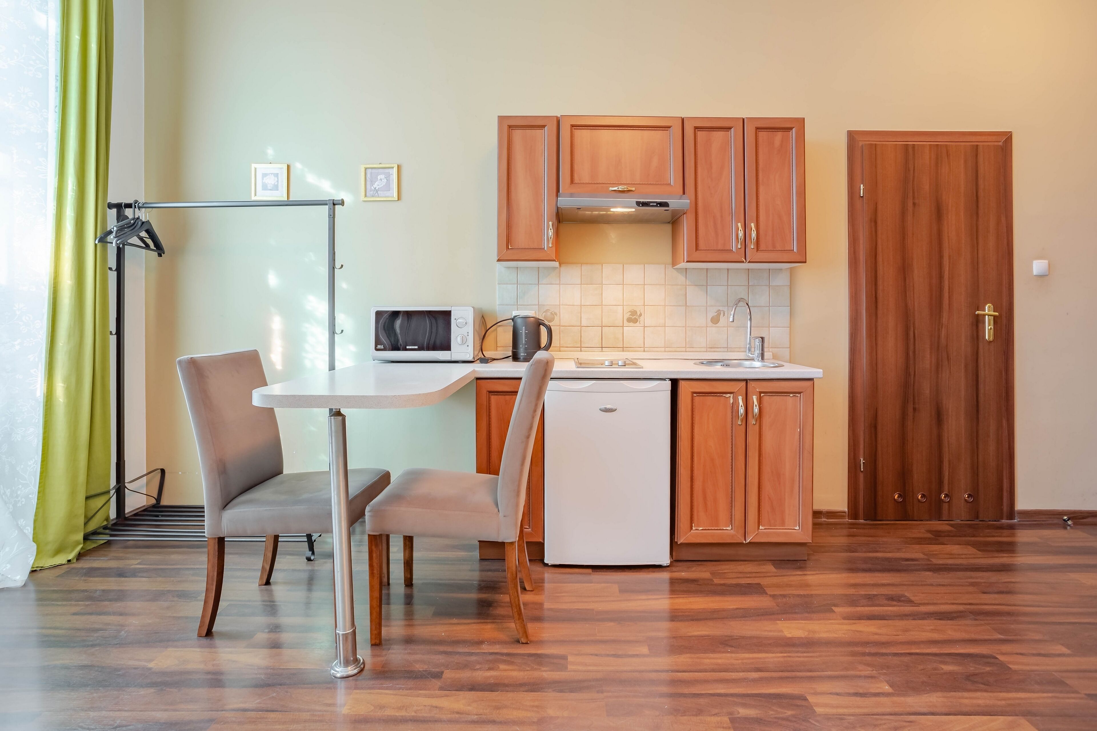 classic quadruple room | living area | flat-screen tv