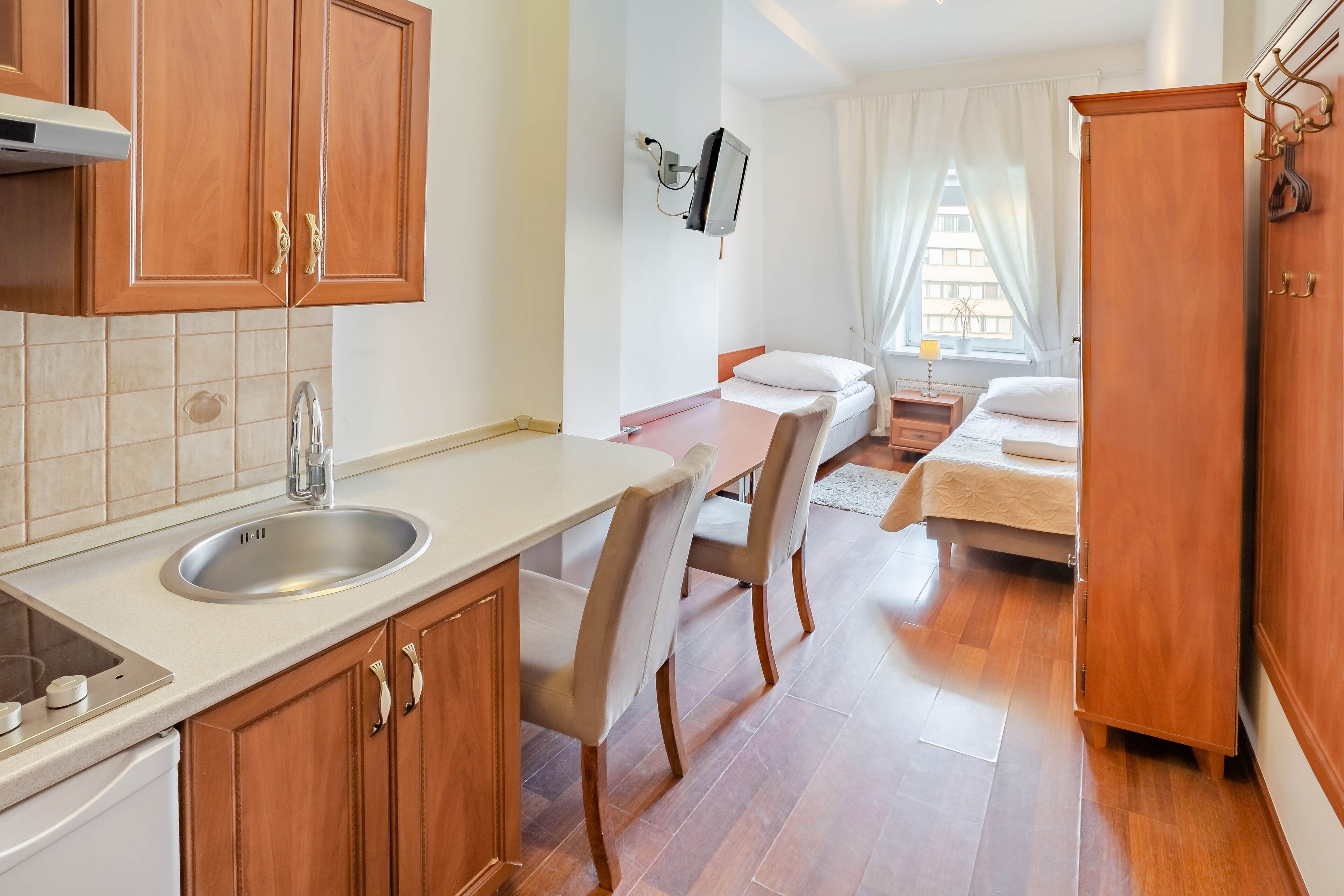 standard double or twin room | living area | flat-screen tv