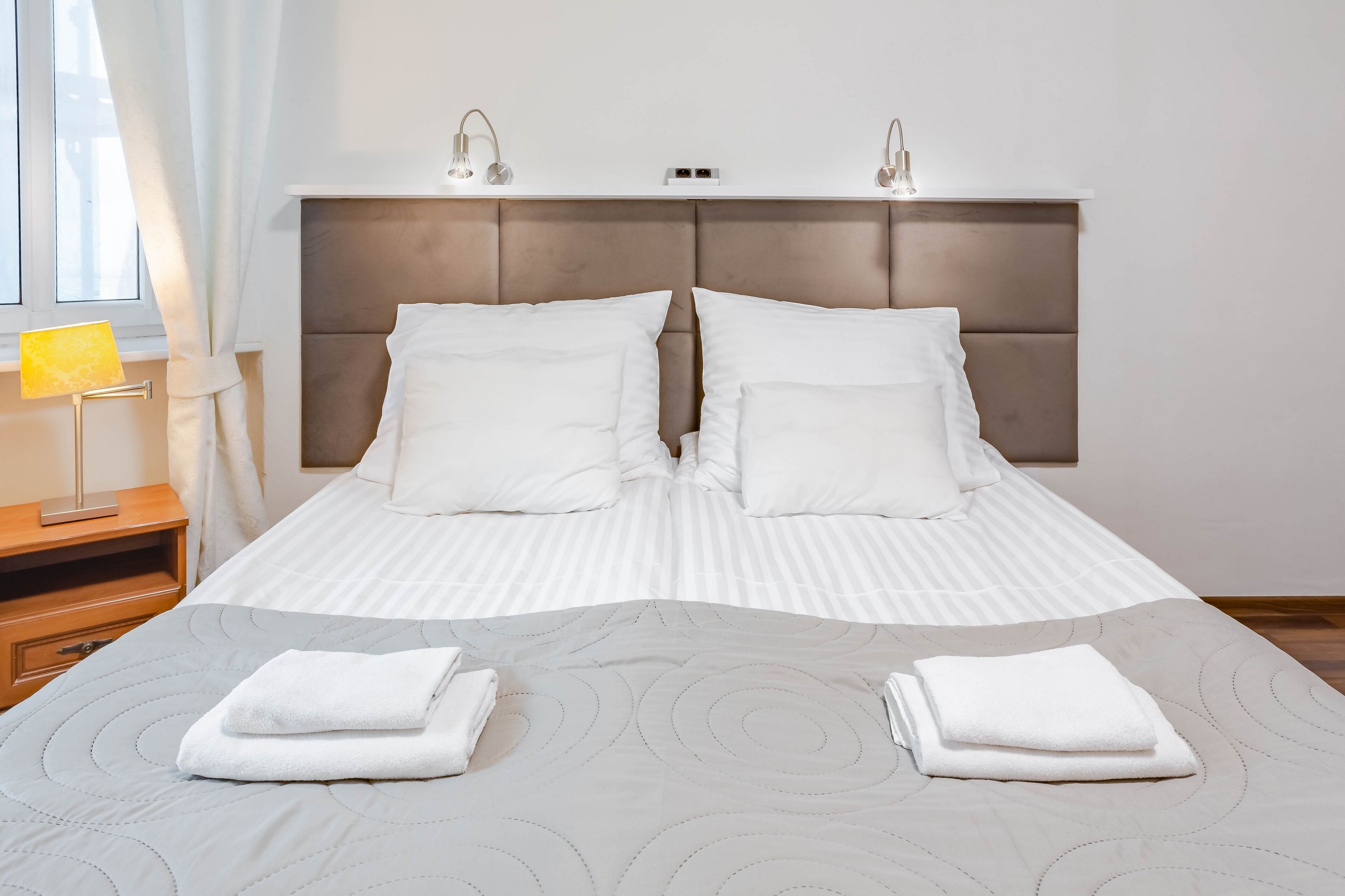 classic quadruple room | living area | flat-screen tv