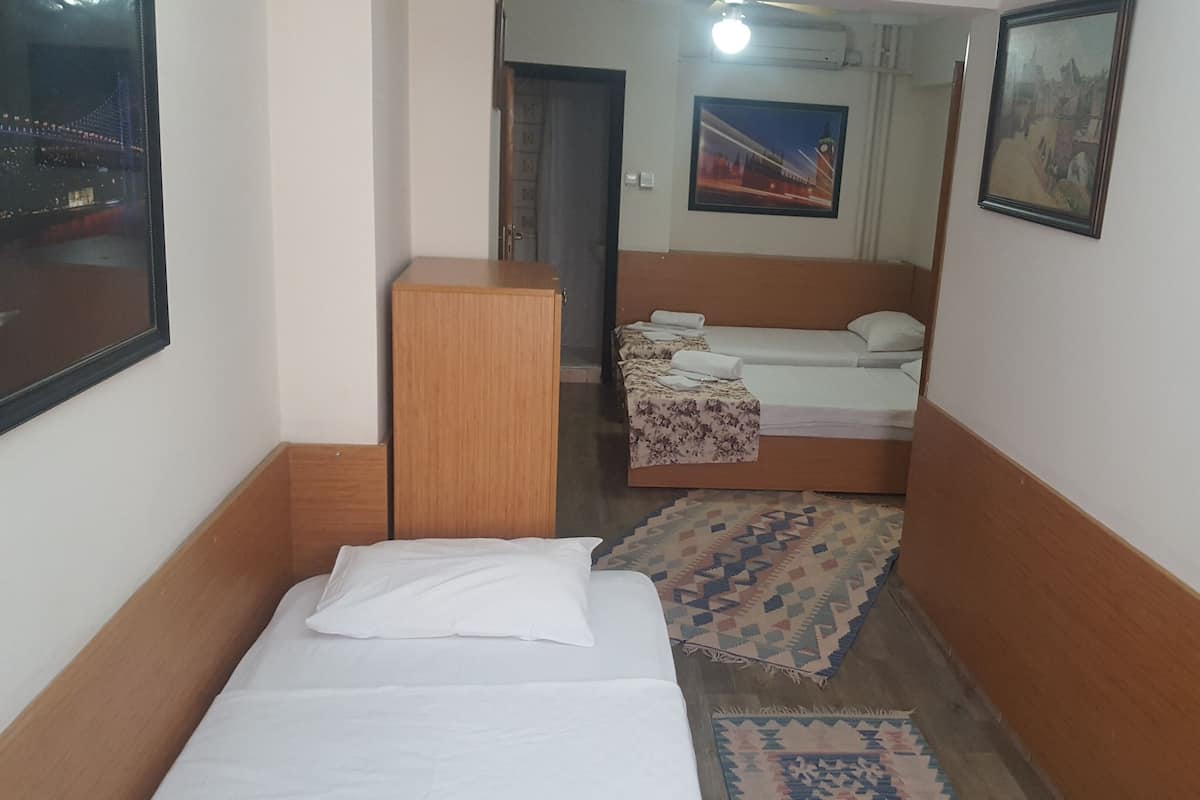 Driepersoonskamer | Luxe beddengoed, gratis wifi, beddengoed