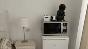 经济四人房, 多张床, 公共浴室 | 熨斗/熨板、免费 WiFi