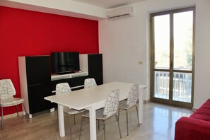 Apartment, 3 Bedrooms, Balcony | Living area | TV