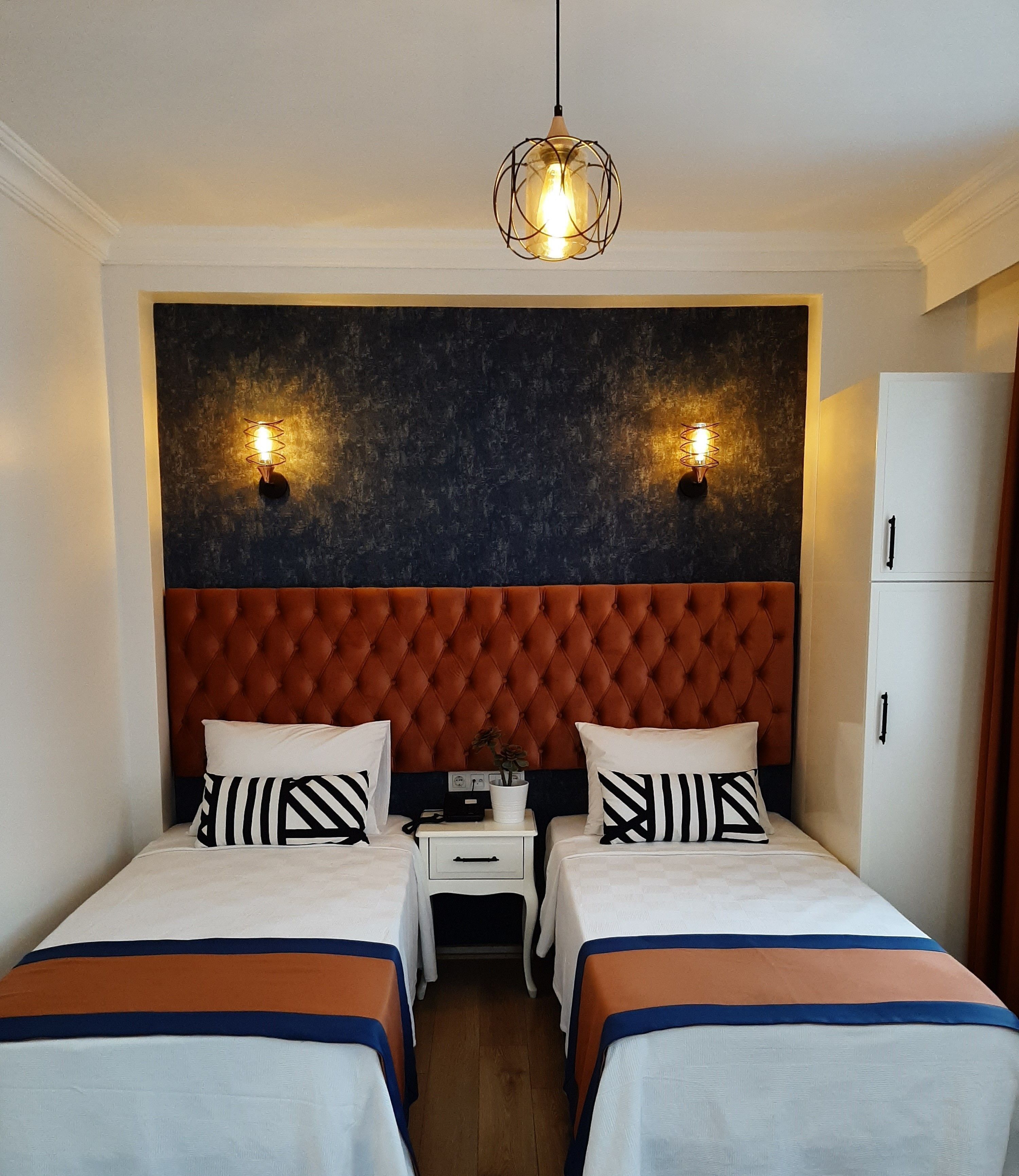 Desk, laptop workspace, free WiFi, bed sheets