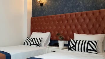 Desk, laptop workspace, free WiFi, bed sheets