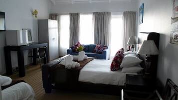 Premium bedding, minibar, desk, free cribs/infant beds