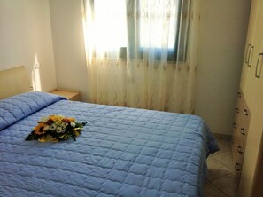 Apartment, 2 Bedrooms | 2 bedrooms, free cots/infant beds - Terme di Casteldoria - Appartamento 46 (Santa Maria Coghinas)