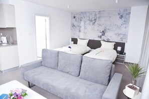 Premium bedding, desk, soundproofing, iron/ironing board