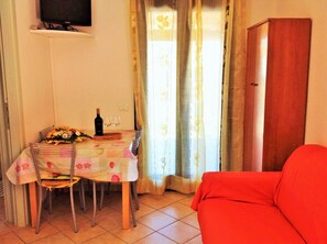 Apartment, 1 Bedroom | Living area | TV