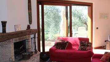 Villa, 2 Bedrooms | Living area | TV, fireplace