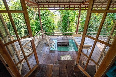Área de sala de estar. Aum Hum Homestay
