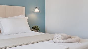 Habitación doble estándar | Ropa de cama de alta calidad y artículos del minibar gratis