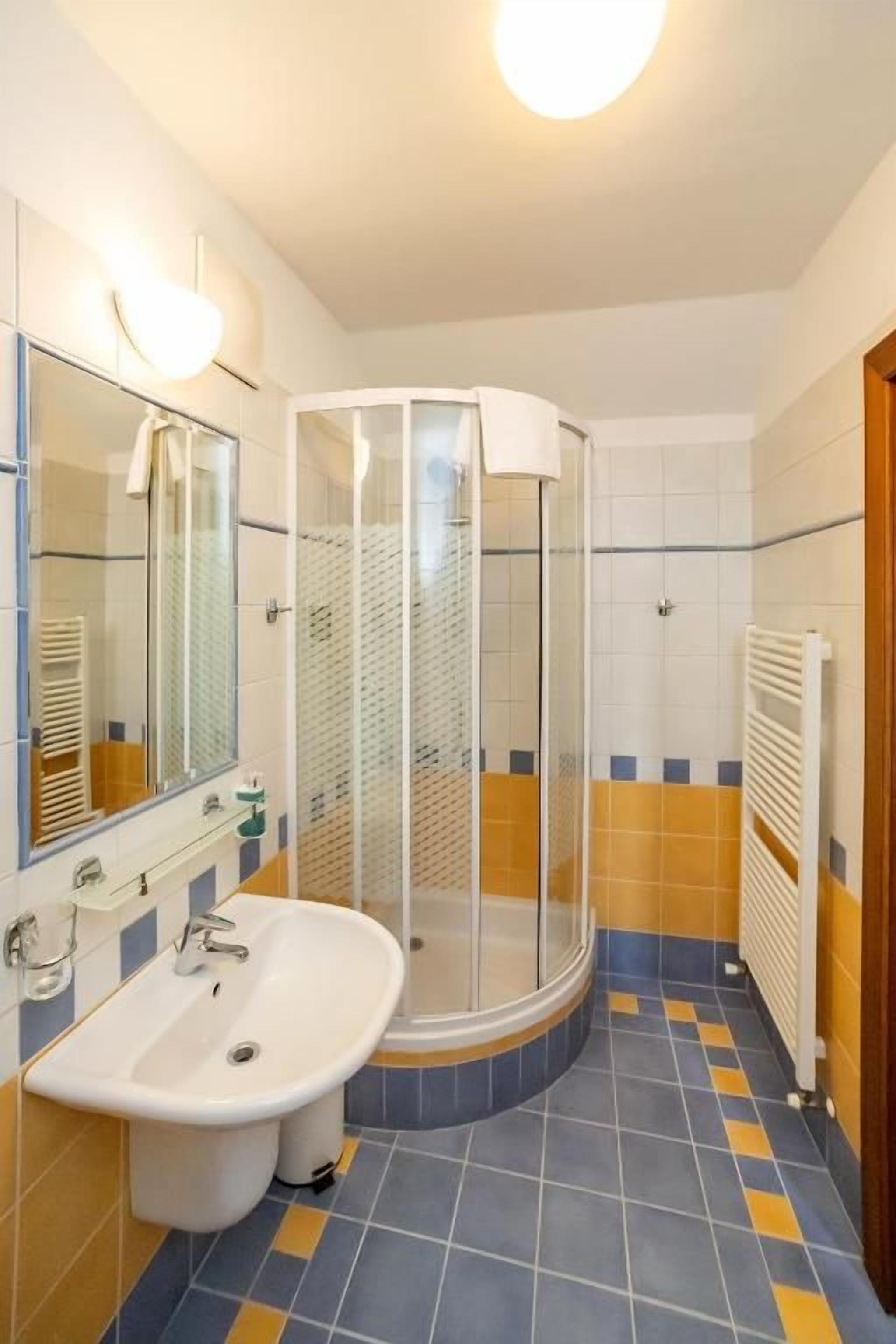 Shower, free toiletries, hair dryer (on request), towels