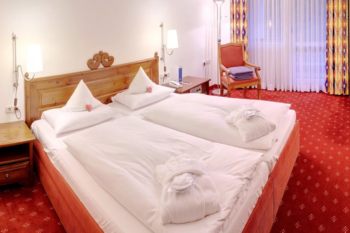 premium bedding, in-room safe, desk, rollaway beds