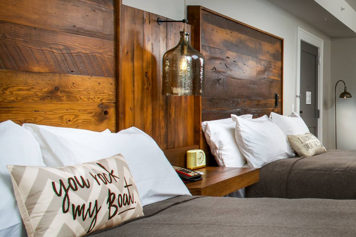 standard room, 2 queen beds | premium bedding, iron/ironing board, free cots/infant beds, free wifi